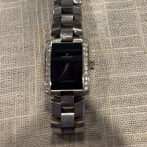 Movado woman’s watch.. great condition. Needs new battery